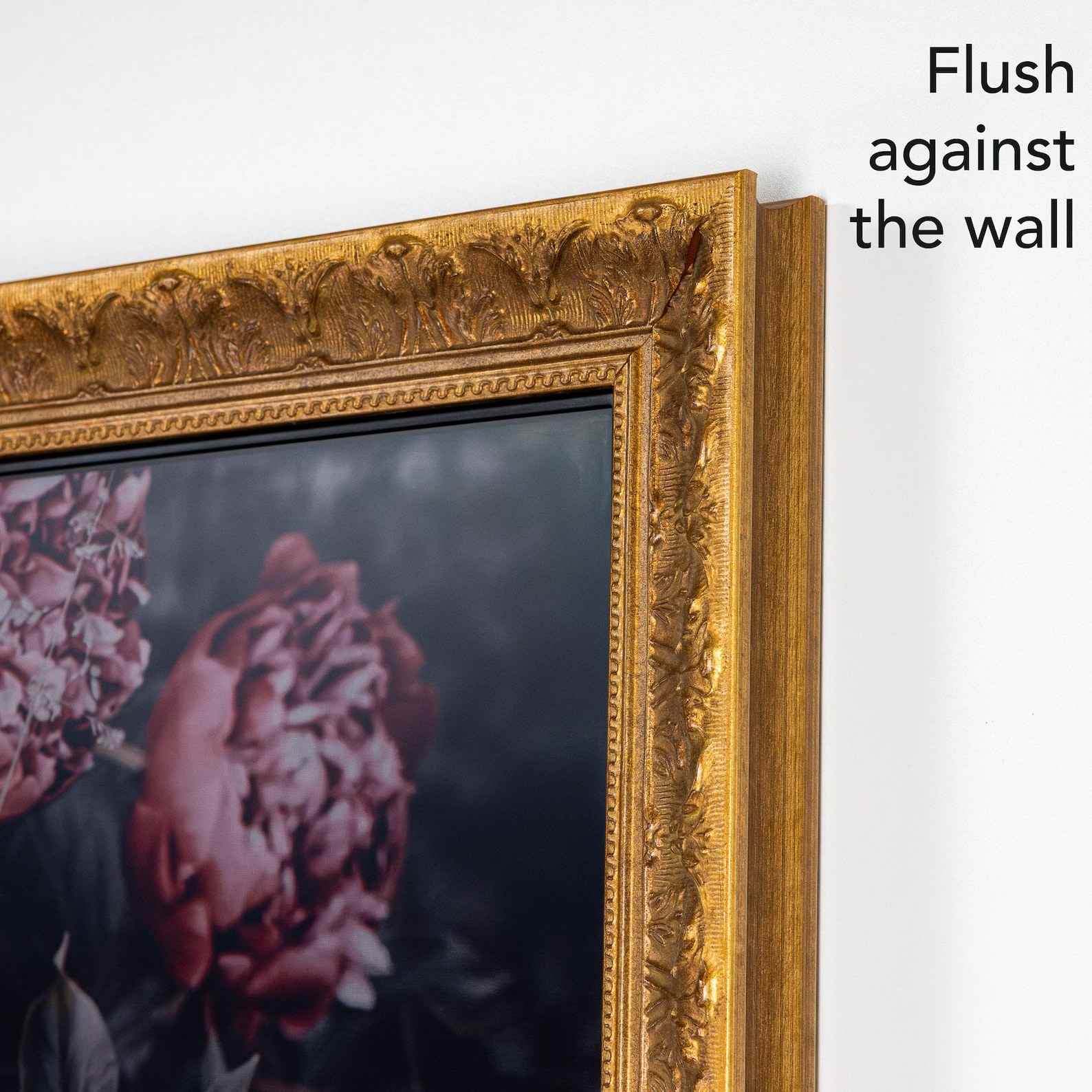 Wooden golden distressed frame flush against the wall