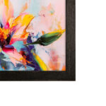 Close-up of the black oak frame's rich wood grain, demonstrating how it beautifully complements vibrant artwork and turns your blank screen into a striking gallery piece.