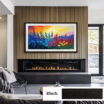 Sleek black solid wood TV frame transforming a wide flat-screen over a modern fireplace into a stunning piece of framed digital wall art.