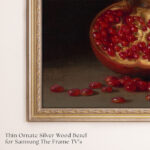 Close-up of the premium thin ornate silver wood bezel, designed to elevate the aesthetic of Samsung The Frame TVs.