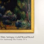 Detailed corner view highlighting the elegant, thin antique gold wood bezel designed specifically to elevate and blend your Samsung The Frame TV with your home decor.