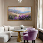 Ornate TV frame displaying landscape art in a soft, contemporary living room, elevating your elegant room aesthetics by turning a blank screen into beautiful art.