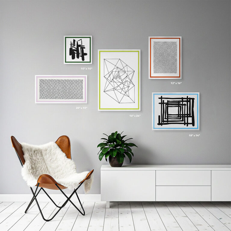 Personalized white frame with a navy blue inner border by EventFrame in a child’s nursery. The playful pop of color adds character to whimsical wall art.