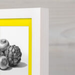 EventFrame white 1-inch molding with a sophisticated grey inner line, showcased in a minimalist hallway. Fits standard poster sizes like 24x36 and A2.