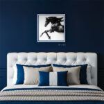 EventFrame white frame with a blue accent line, highlighting the durable v-nail joints and acid-free backing used to protect valuable artwork.