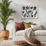 EventFrame vibrant wood frame styled in modern living room gallery wall, custom size for 11 x 14 and 24 x 36 artwork