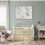 An EventFrame white two-toned frame with a purple inner line sitting on a desk in a sunlit studio. This versatile frame is a great gift for photography lovers and fits sizes like 5x7 and 11x14.