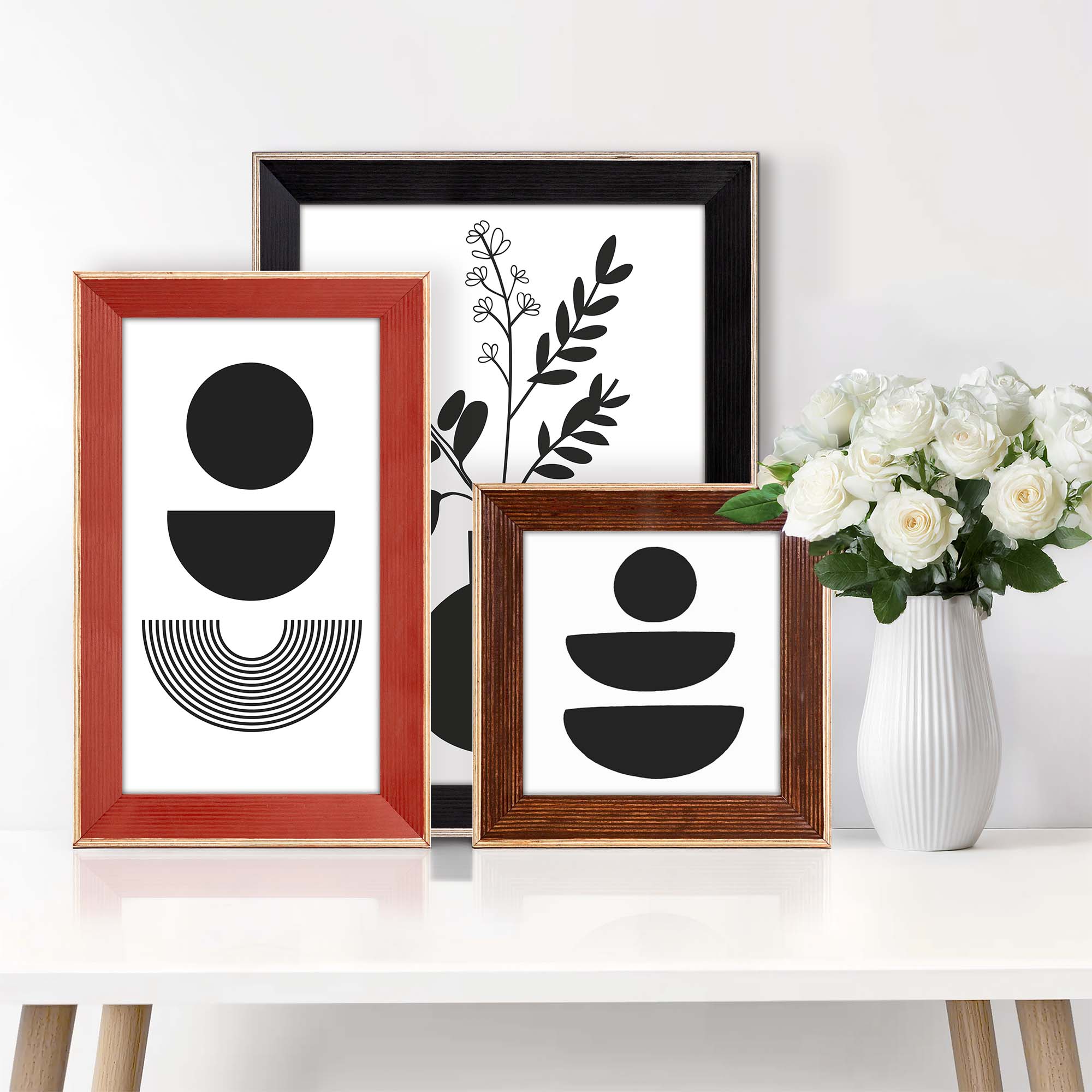 red picture frame, brown picture frame, black picture frame