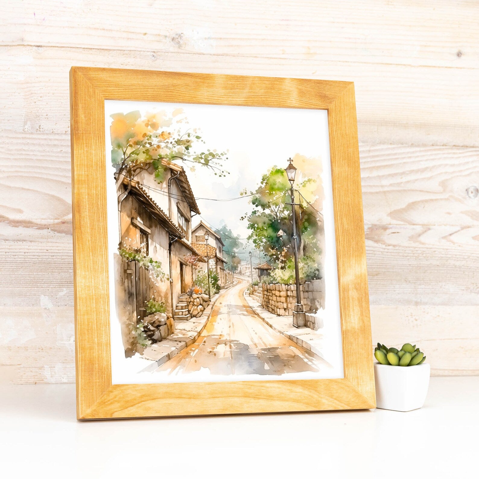Framed artwork of a street scene with a wooden frame on a light wooden background. Natural BIRCH Picture Frame in Flat Style, Handmade Solid Hardwood Photo Frame, Modern Gallery Wall Frames, Custom Size A1 5x7 11x17 24x36