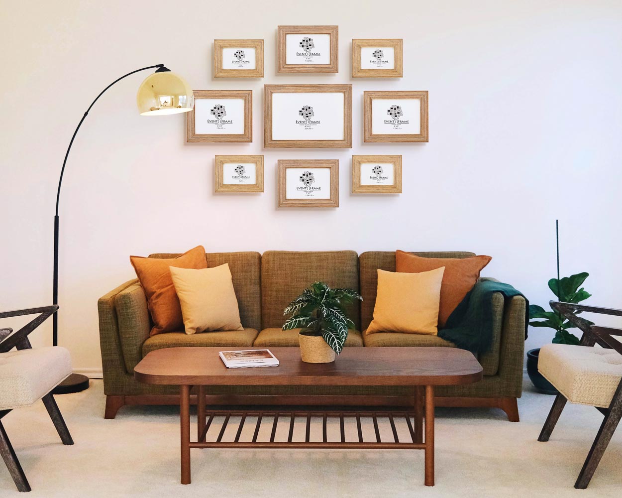 Set of natural wood handrafted quality picture frames in modern home on blank wall above couch.