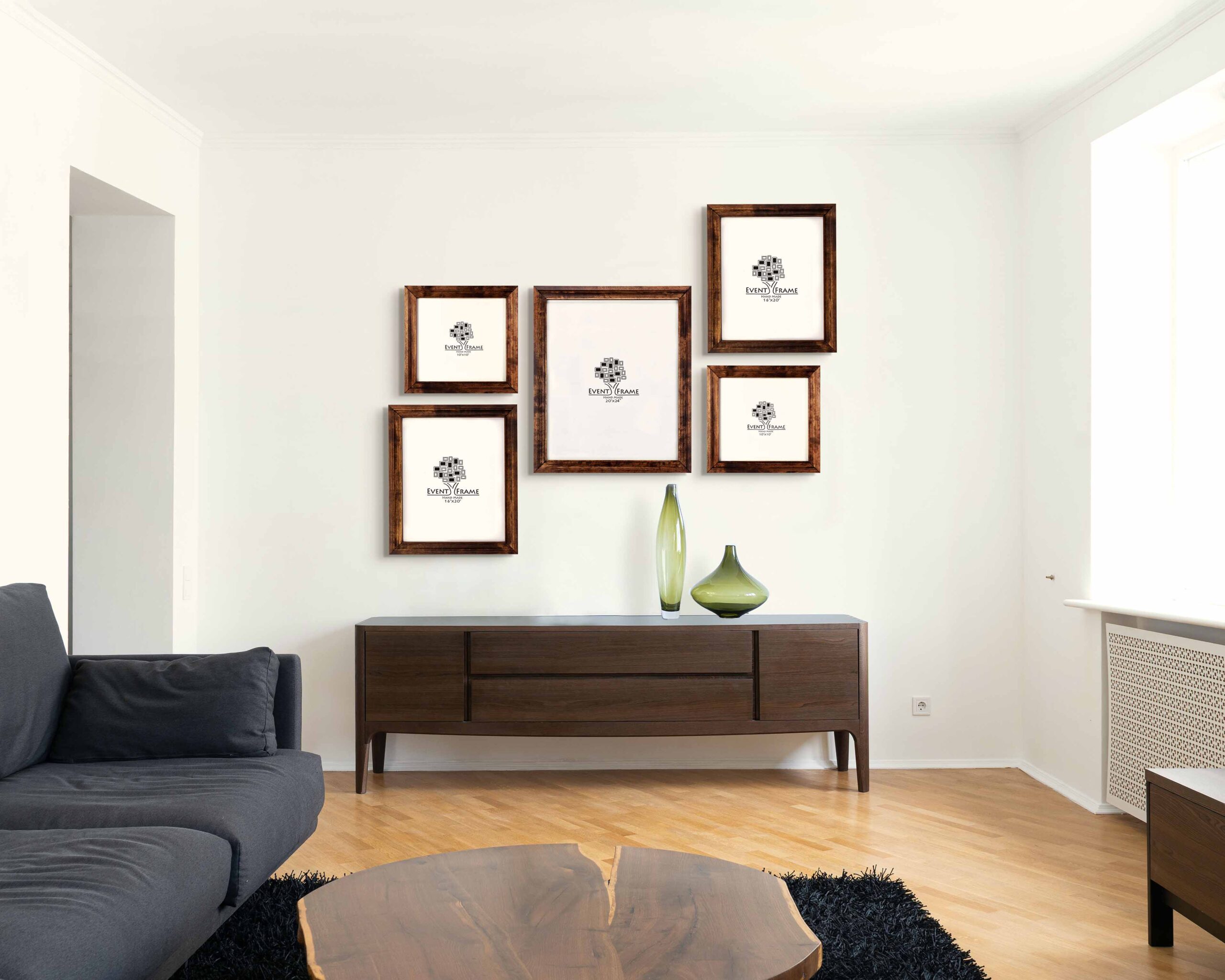 Set of five wooden picture frames placed in a modern home.