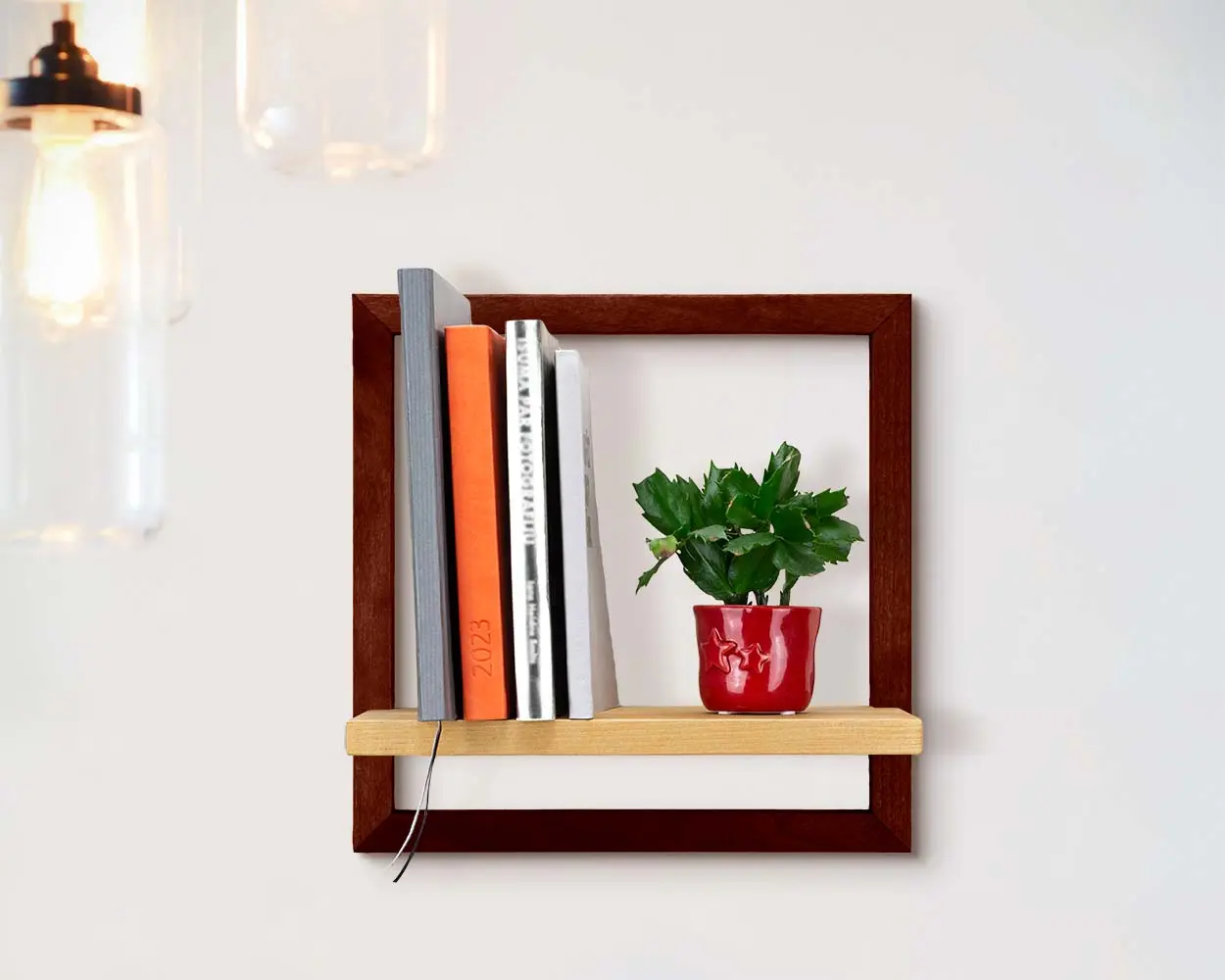 Étagère flottante tendance et unique, en bois, faite à la main, pour le rangement de livres ou de plantes, disponible en couleurs et dimensions personnalisées.